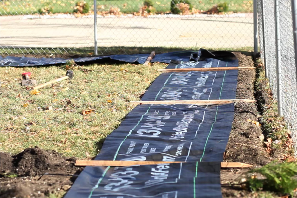 Silt fencing laying on the ground ready for installation